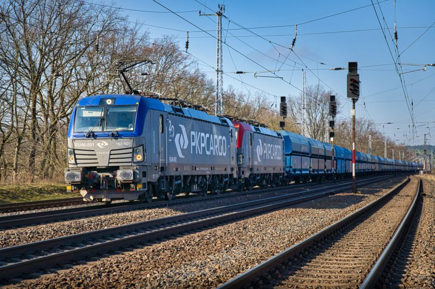 Saarmund, Germany – February 27, 2022: A locomotive freight train driving in the countryside
